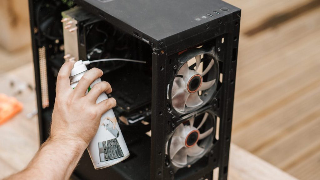 compressed air can cleaning desktop computer
