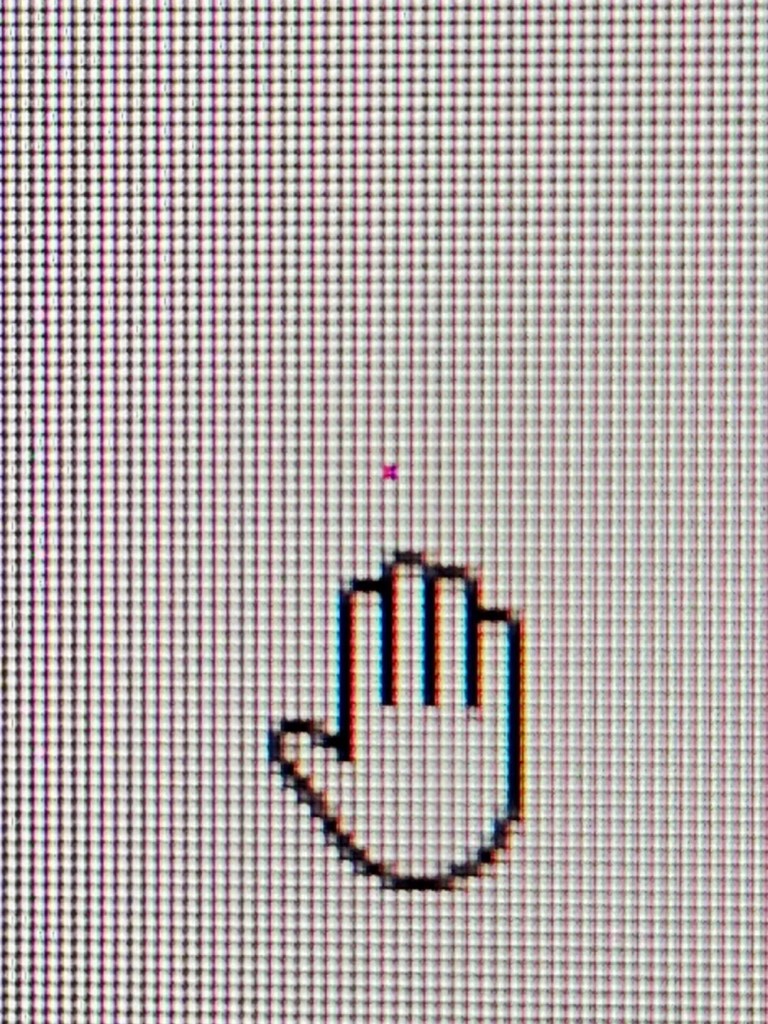 single stuck pixel in red on monitor screen